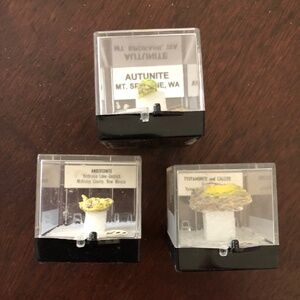 Uranium rock samples.  Fluoresce under Black light.